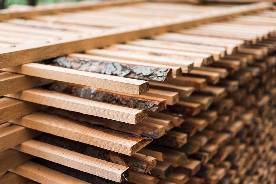 freshly cut wood stacked for lumber air drying close up